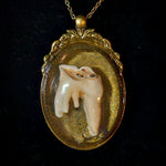 COW TOOTH IN RESIN CABOCHON NECKLACE